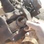 remove_brake_caliper_piston_heat_shield.jpg
